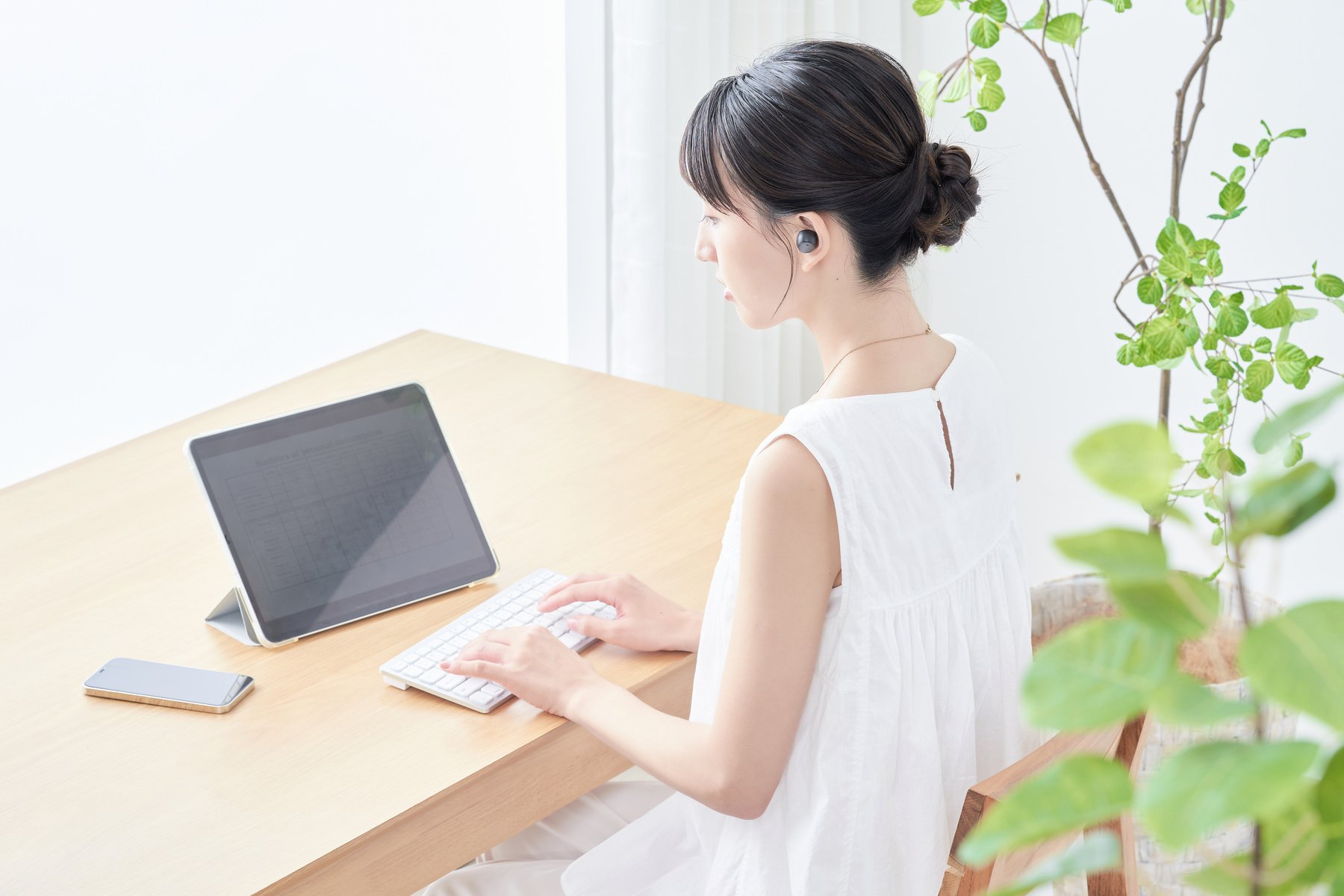 young woman using tablet PC